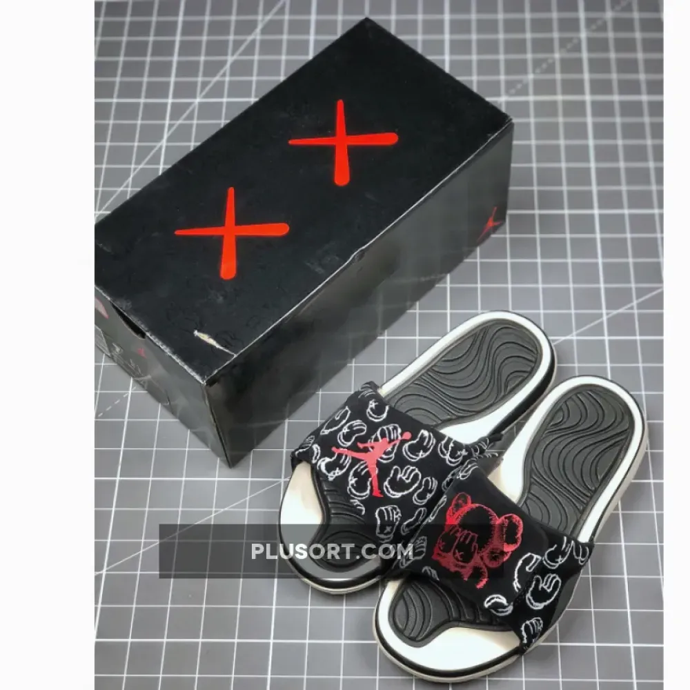 Kaws x Air Jordan 4 Black Slide Sandals