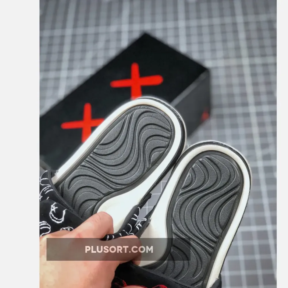 Kaws x Air Jordan 4 Black Slide Sandals